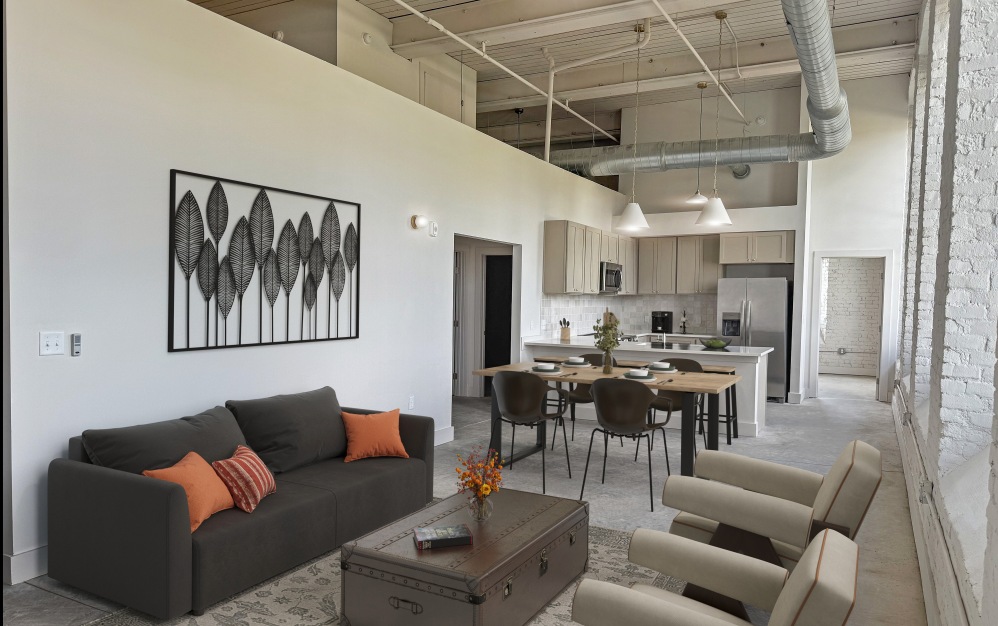 Room with lounge seating and ample windows