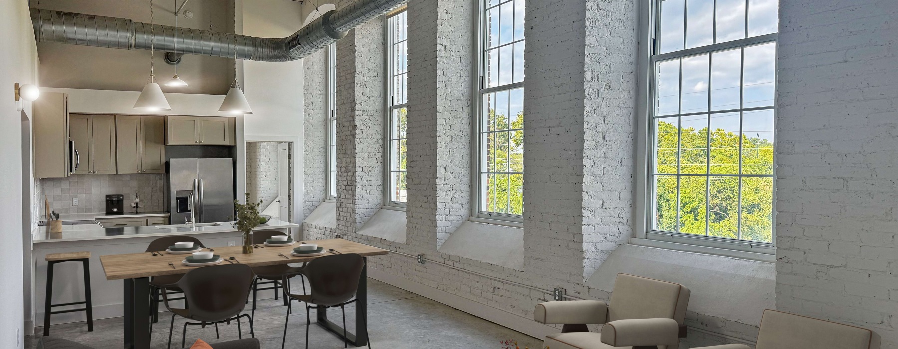 Room with lounge seating and ample windows