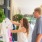 Two people shopping locally 