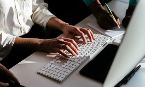 hands on a keyboard